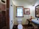 Well-appointed bathroom with a tiled shower, toilet, and vanity, offering a clean and functional space at 157 Old Hearth Rd, Clover, SC 29710