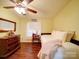 Cozy bedroom with dresser and day bed, with laminate wood floors at 157 Old Hearth Rd, Clover, SC 29710