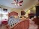 Comfortable bedroom with wooden floors, a kitchenette, and a cozy sleeping area, offering convenience and style at 157 Old Hearth Rd, Clover, SC 29710