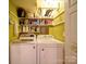 Functional laundry room with shelving and appliances at 157 Old Hearth Rd, Clover, SC 29710