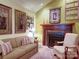 Inviting living room with a fireplace, comfortable seating, and stylish decor creating a cozy atmosphere at 157 Old Hearth Rd, Clover, SC 29710