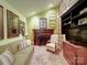 Inviting living room with a fireplace, comfortable seating, and stylish decor creating a cozy atmosphere at 157 Old Hearth Rd, Clover, SC 29710