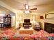 Comfortable living room with a fireplace and elegant decor, perfect for relaxation at 157 Old Hearth Rd, Clover, SC 29710