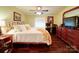 Inviting bedroom with hardwood floors, ceiling fan, and classic decor at 157 Old Hearth Rd, Clover, SC 29710
