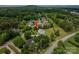 Aerial view highlighting the neighborhood, surrounding trees, and the property's location at 1621 Lakefield Cir, Gastonia, NC 28056