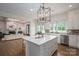 Open kitchen layout features a large island with seating and views of the living room at 1621 Lakefield Cir, Gastonia, NC 28056