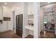 Convenient kitchen layout with built-in desk, stainless steel refrigerator, and hardwood floors at 1621 Lakefield Cir, Gastonia, NC 28056