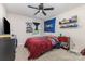 Cozy bedroom features a ceiling fan, carpeted floors, and a window for natural light at 164 Shepherds Landing Dr, Mooresville, NC 28115