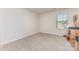 Empty bedroom features a window, carpet, and ample space to personalize as you see fit at 164 Shepherds Landing Dr, Mooresville, NC 28115