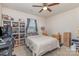 Bedroom featuring a neutral color palette, comfortable bed, and built-in shelving at 164 Shepherds Landing Dr, Mooresville, NC 28115