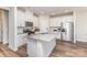 Modern kitchen with white cabinetry, granite countertops, and stainless steel appliances at 164 Shepherds Landing Dr, Mooresville, NC 28115