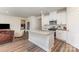 Open kitchen features white cabinets, granite countertops, and stainless steel appliances at 164 Shepherds Landing Dr, Mooresville, NC 28115