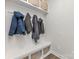 Mudroom features custom storage with bench and baskets for optimal organization at 164 Shepherds Landing Dr, Mooresville, NC 28115