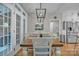 Bright dining room with ample natural light, hardwood floors, and direct access to the outdoor living at 1747 30Th Avenue Ne Dr, Hickory, NC 28601