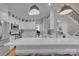 Well-appointed kitchen with white cabinetry, stainless steel appliances, and convenient counter seating at 1747 30Th Avenue Ne Dr, Hickory, NC 28601