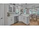 Beautiful open kitchen area with white counters and cabinets, stainless appliances, and hardwood floors at 1747 30Th Avenue Ne Dr, Hickory, NC 28601