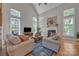 Spacious living room with soaring ceilings, abundant natural light, and comfortable seating perfect for relaxation at 1747 30Th Avenue Ne Dr, Hickory, NC 28601