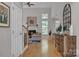 Bright living room with vaulted ceilings, a cozy fireplace, and hardwood floors create an inviting atmosphere at 1747 30Th Avenue Ne Dr, Hickory, NC 28601