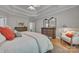 Bright main bedroom featuring neutral walls, hardwood floors, and tasteful furniture at 1747 30Th Avenue Ne Dr, Hickory, NC 28601