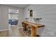 Office space featuring a custom live edge wooden desk and comfortable chairs at 1747 30Th Avenue Ne Dr, Hickory, NC 28601