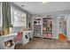 Bright office space with built-in bookcases and desk area by a sunlit window at 1747 30Th Avenue Ne Dr, Hickory, NC 28601