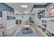 Spacious recreation room, featuring built-in storage, a play area, and a table at 1747 30Th Avenue Ne Dr, Hickory, NC 28601