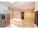 The kitchen features an island, stainless steel refrigerator, and is adjacent to the dining room at 1961 Runnymede Ln, Charlotte, NC 28211