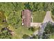 Aerial view of a home with a backyard deck, water access, and surrounding trees at 2010 Dogwood Trl, Shelby, NC 28150