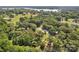Overhead view highlights a charming lakefront community with homes and extensive green space at 2010 Dogwood Trl, Shelby, NC 28150
