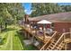 Large outdoor deck with ample seating, grill and shade, perfect for entertaining at 2010 Dogwood Trl, Shelby, NC 28150