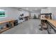 Basement room equipped with a table saw, a chop saw, and a work bench at 2010 Dogwood Trl, Shelby, NC 28150