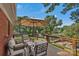 Deck with outdoor seating, an umbrella, and views of the lake at 2010 Dogwood Trl, Shelby, NC 28150