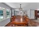 Spacious dining area with hardwood floors, a large window and room for Gathering dining at 2010 Dogwood Trl, Shelby, NC 28150