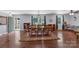 Elegant dining room featuring hardwood floors, neutral walls, and a classic area rug at 2010 Dogwood Trl, Shelby, NC 28150