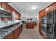 Open-concept kitchen with a center island and views into the living room at 2010 Dogwood Trl, Shelby, NC 28150