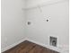 Laundry room with vinyl flooring, wire shelving, and hookups at 2039 Sadler Woods Ln, Charlotte, NC 28214