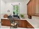 Home office featuring custom cabinets, desk with drawers, and a bright window at 2240 La Maison Dr, Charlotte, NC 28226