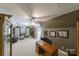 Spacious bonus room featuring dormer windows, ample seating, and neutral carpet at 2314 Winding Oaks Trl, Waxhaw, NC 28173