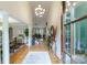 Grand entryway boasts soaring ceilings, hardwood floors, and an open view, creating a welcoming atmosphere at 2314 Winding Oaks Trl, Waxhaw, NC 28173