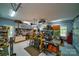 Organized garage featuring ample tool and supply storage, a work area, and good lighting at 2314 Winding Oaks Trl, Waxhaw, NC 28173