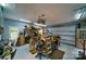 Organized garage featuring ample tool and supply storage, a work area, and good lighting at 2314 Winding Oaks Trl, Waxhaw, NC 28173
