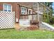 The backyard has a Generac generator and a wooden pergola for outdoor enjoyment at 24008 Carriker Rd, Albemarle, NC 28001
