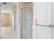 Bathroom featuring clear glass shower with tile surround at 24008 Carriker Rd, Albemarle, NC 28001