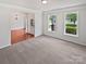 Inviting living room filled with natural light and a view of the entry at 2479 N Legacy Park Blvd, Fort Mill, SC 29707
