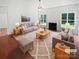 Bright living room boasting large windows and elegant neutral decor at 2479 N Legacy Park Blvd, Fort Mill, SC 29707