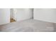 Spacious bedroom with plush carpet, white walls and trim, and plenty of natural light at 270 Bezelle Ave, York, SC 29745