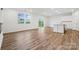 Bright living room featuring sleek floors, recessed lighting, and sliding glass door to backyard at 270 Bezelle Ave, York, SC 29745