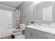 Modest bathroom features a tub and shower combination, a modern vanity, and neutral decor at 301 Honeywood Ave, Charlotte, NC 28216