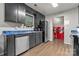 Features an ample counter space, stainless steel refrigerator, and a convenient laundry area at 301 Honeywood Ave, Charlotte, NC 28216