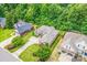 Beautiful aerial view of houses in the neighborhood, highlighting the mature trees and the home's location at 305 River Birch Cir, Mooresville, NC 28115